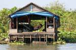 Siesta en una hamaca, Tonle Sap, Camboya.