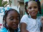 Retrato de niñas con coletas, Boca Chica, Rep. Dominicana.