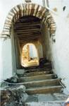 Tinos, callejón arqueado, Grecia.
