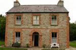 Mansión de piedra y ladrillo, Bunratty Folk Park, Irlanda.