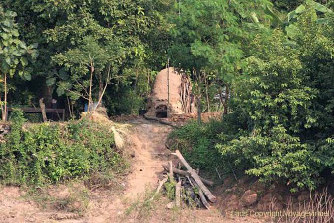 Carbón de leña Horno, Mekong, Laos Sur, Laos