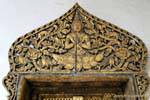 Frontón de Wat Xieng largas Khun hombres, Luang Prabang, Laos.