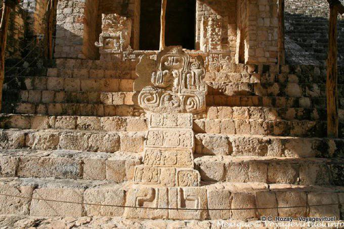 Estela en cabeza de serpiente, bajo izquierda entrada El Torre, Ek Balam - Mexico