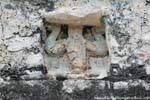Centrarse en un Atlas apoyar el templo Nohoch Mul, Coba, Mexico.