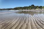 Luz de arena, Oakura Bay, Northland, Nueva-Zelanda.