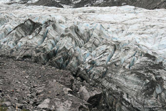 Las olas y las colinas de hielo, Fox Glacier, Costa Occidental - Nueva-Zelanda