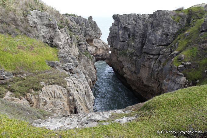 Mar Entrada al sitio de Pancake Rocks, Punakaiki, Costa Occidental - Nueva-Zelanda