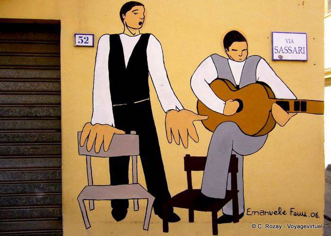 Siniscola, guitarrista y cantante, de 52 Via Sassari, mural - Cerdena