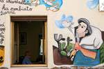 Orgosolo, el campesino y la pantorrilla mirando las palomas, Murales, Cerdena.