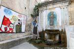 Orgosolo, fuente y la historia Cunzimu Estrella, Murales, Cerdena.