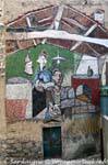 Orgosolo, Via Guhino, interior locales, Murales, Cerdena.