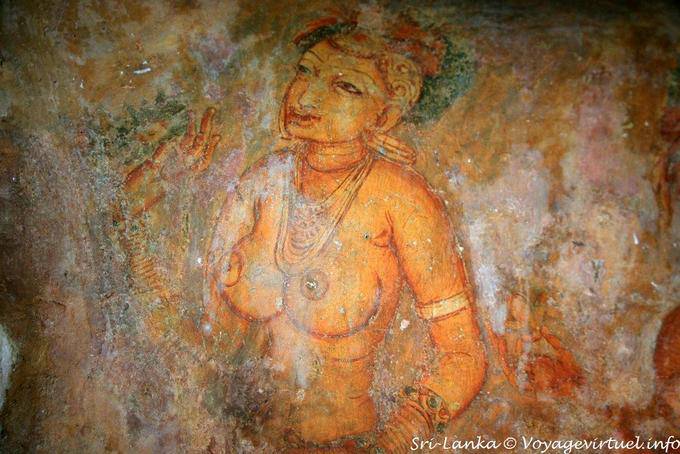 Concéntrese en el pecho desnudo de una mujer y la mano levantada, Sigiriya Los frescos de las damas - Ceilan Sri Lanka